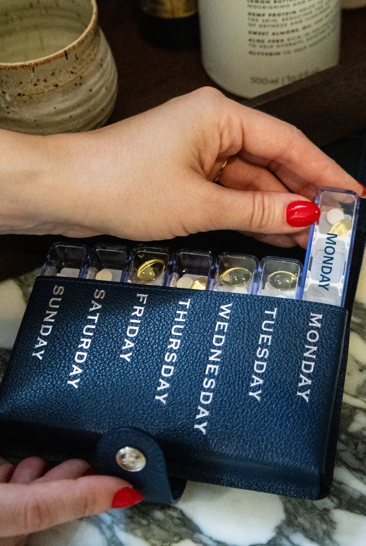 Capra Pill Case — Marine Blue lifestyle