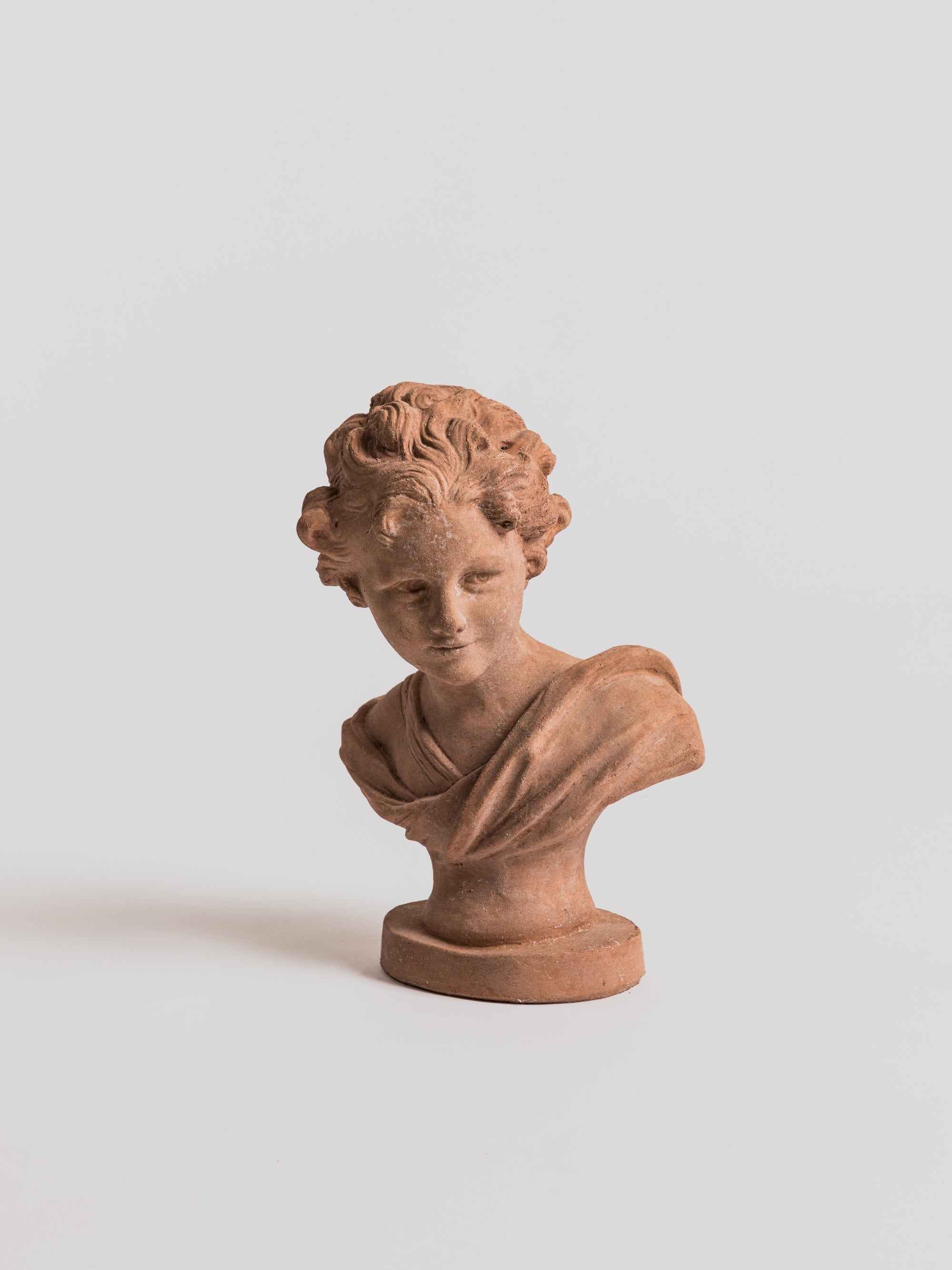 Busto di Ragazzo con Riccioli e Faretra Statue Poggi Ugo