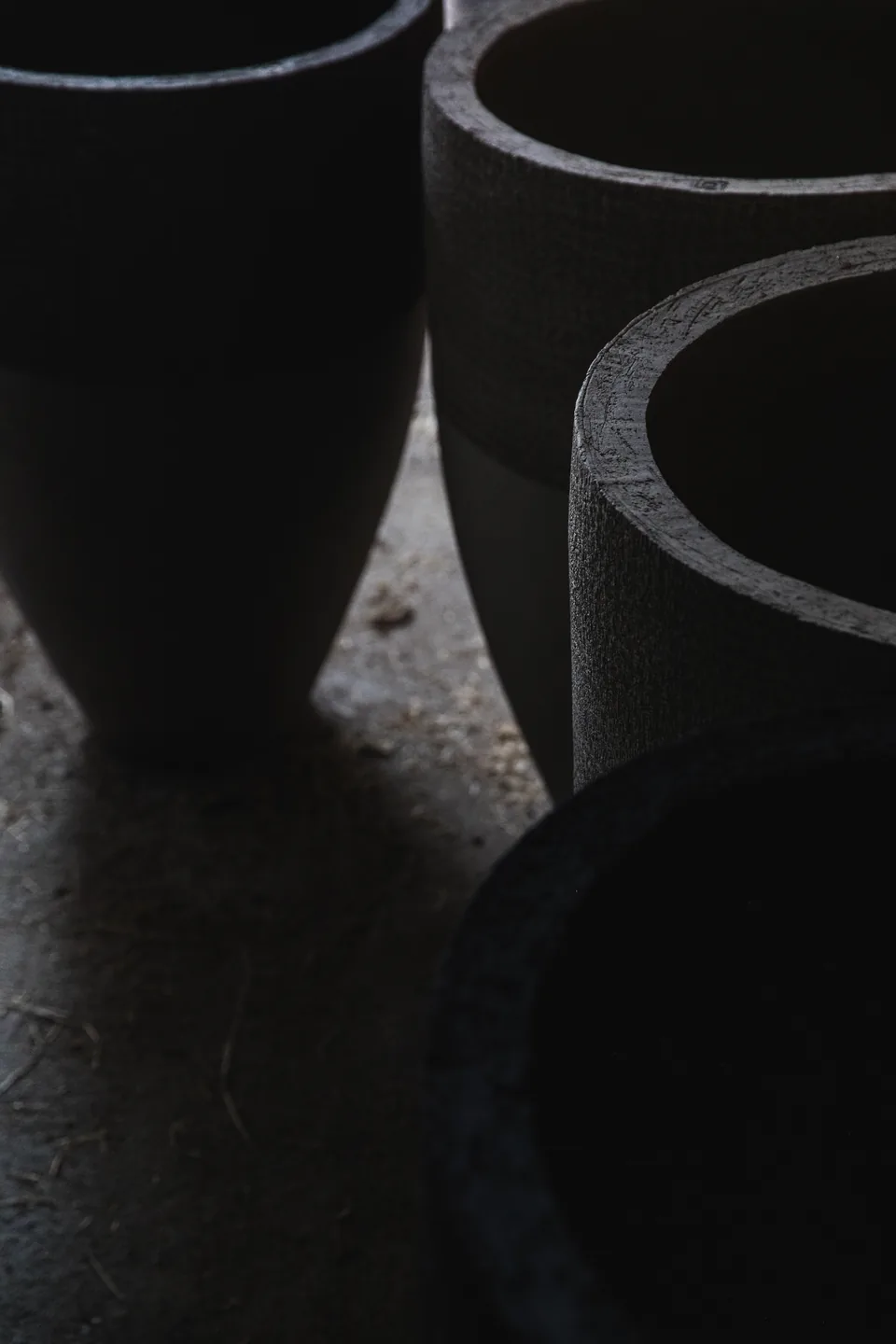 Dark glazed pots